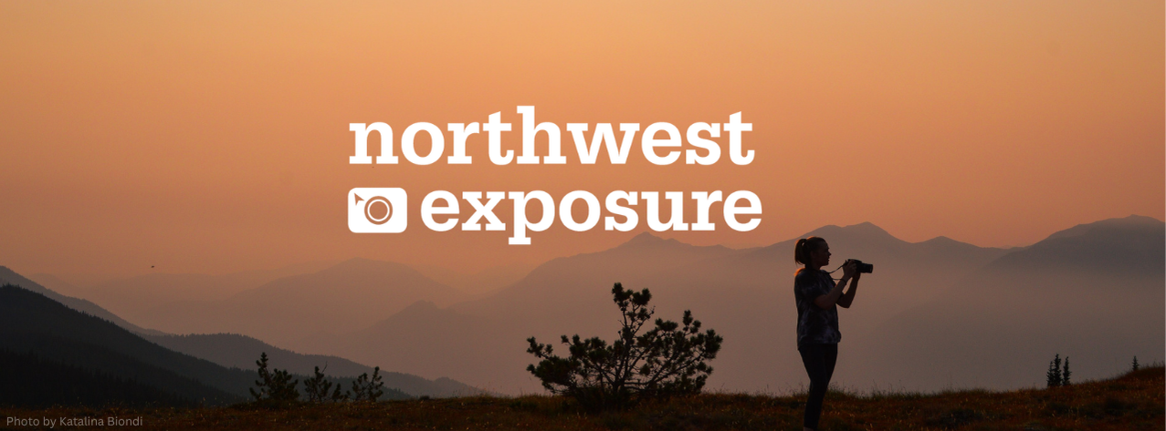 Photo of photographer with mountains and organge sunset as background. with Northwest Exposure logo in the center with white text.