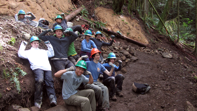 A group of BOLD volunteers flexes their muscles on the Mailbox Peak trail. Photo by WTA staff