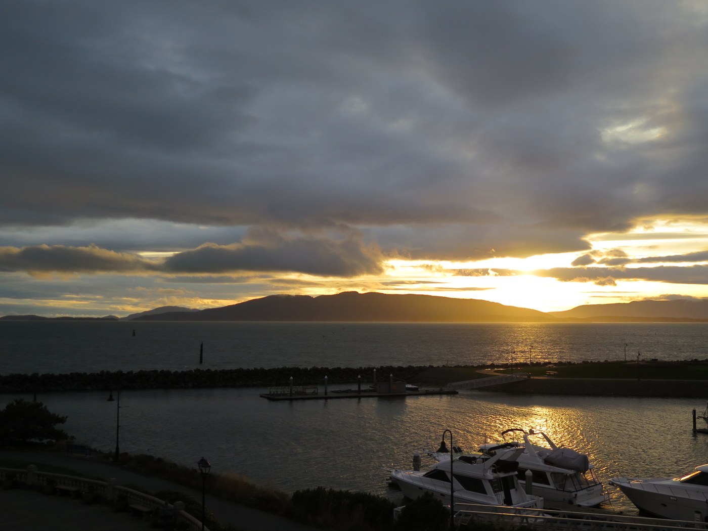 Sunset view of water with mountains