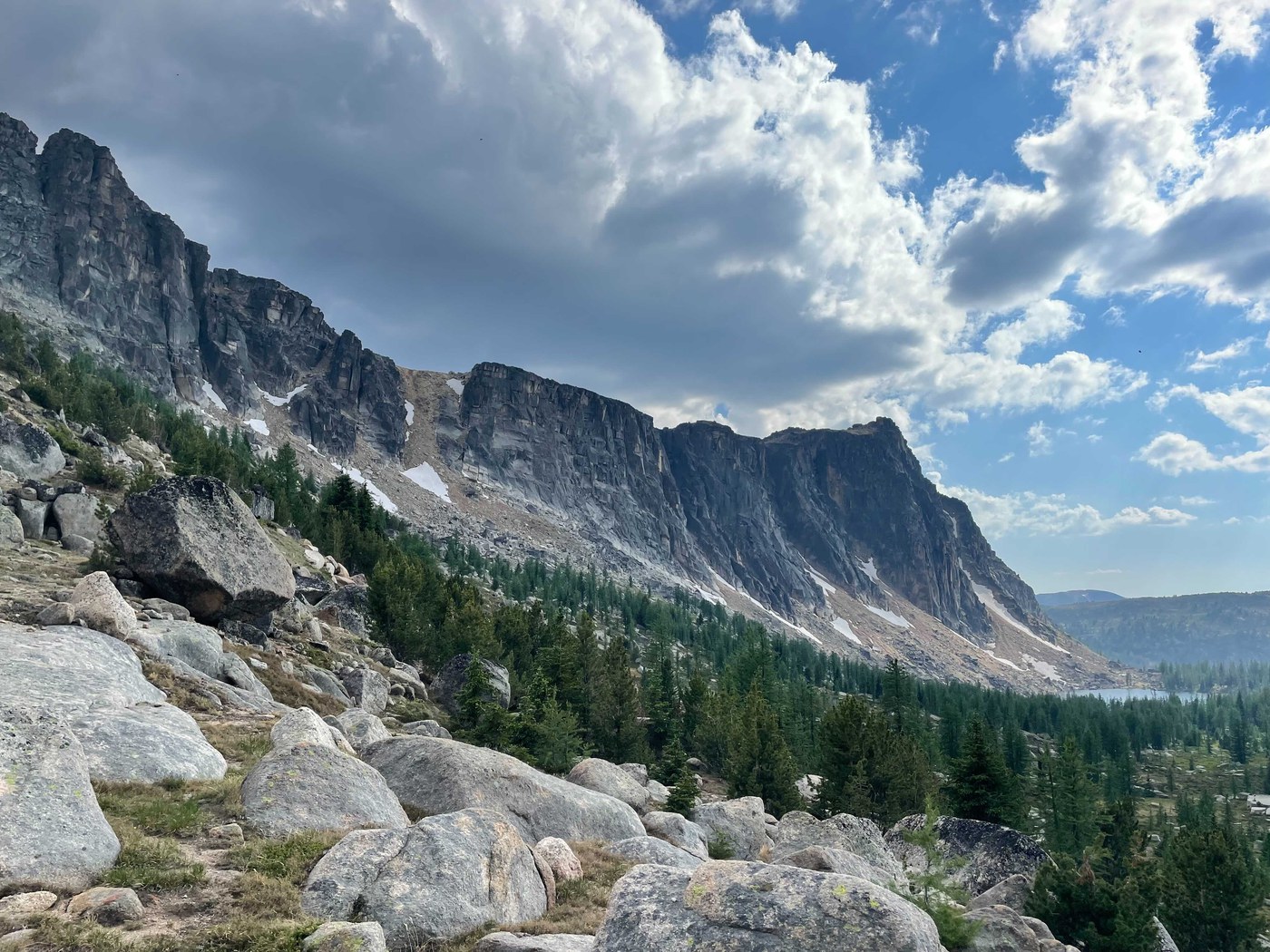 Granite cliffs running through valley.