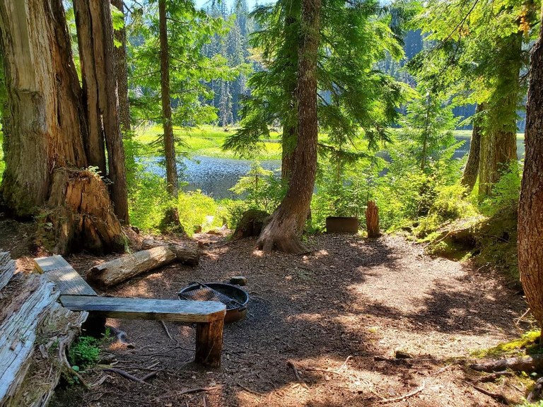 A campsite near Beaverplant Lake on a sunny, calm day. 