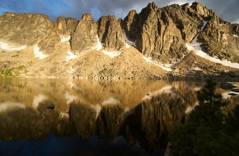 You don't have to thru-hike the Pacific Northwest Trail to appreciate beautiful sections. Photo by trip reporter Hmann A rugged mountainscape reflected in a lake.