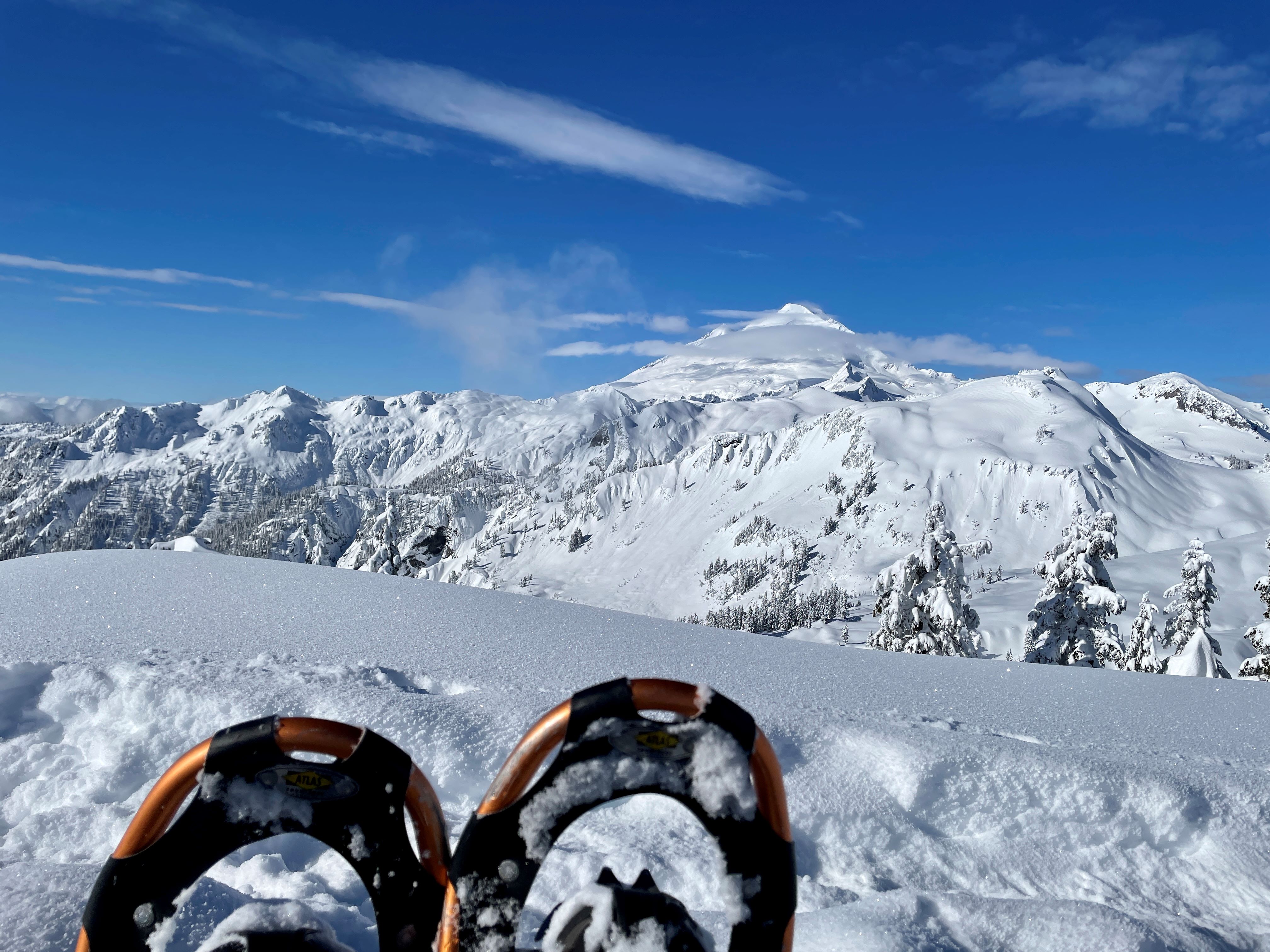 Snowshoer taking a break at Artist Point. Photo by AllOfUs.
