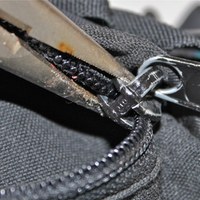 Fixing a Zipper sq Fixing a zipper. Photos by Meg Erznoznik and Kristin Hostetter, courtesy of Falcon Guides.