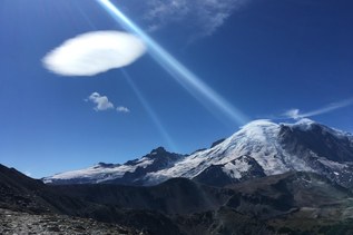 Lenticular cloud over mountains