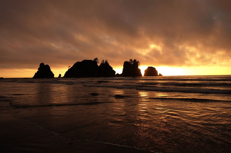 Rock formations in ocean water.