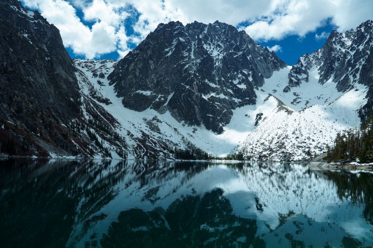 Enchantments. Photo by Mancunian_hiker. The peaks behind Colchuck Lake covered in snow, as well as the lake in the Enchantments. Photo by Mancunian_hiker.