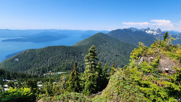 A huge body of water in between mountains in BC.