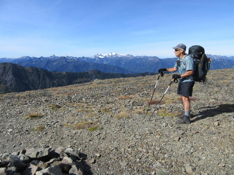 Craig on trail Craig takes in the view from a rocky high point in the backcountry.