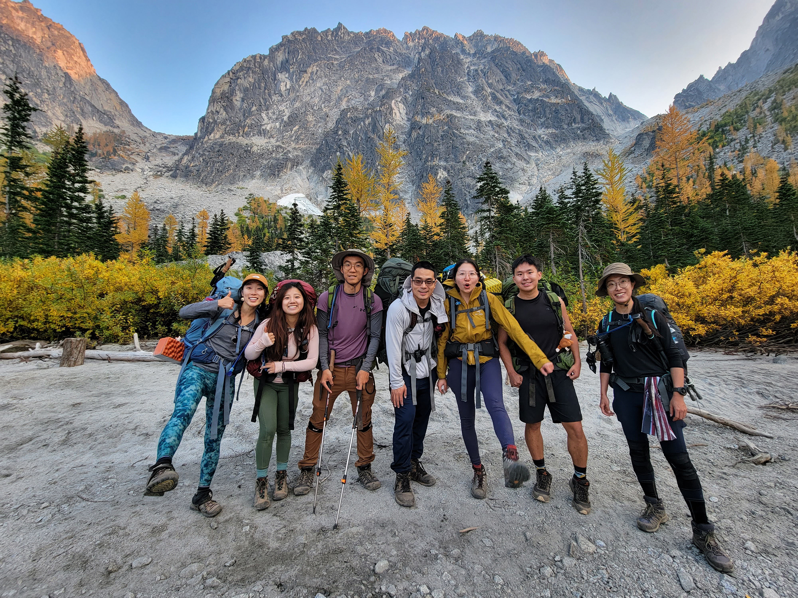 A group of hikers smiling at camera.