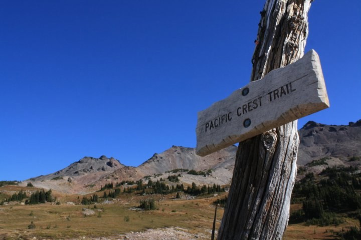 A Pacific Crest Trail sign at Snowgrass Flats, Goat Rocks Wilderness.