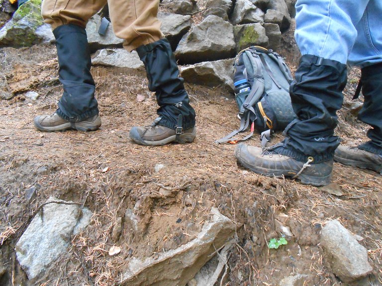 Hikers with gaiters walking