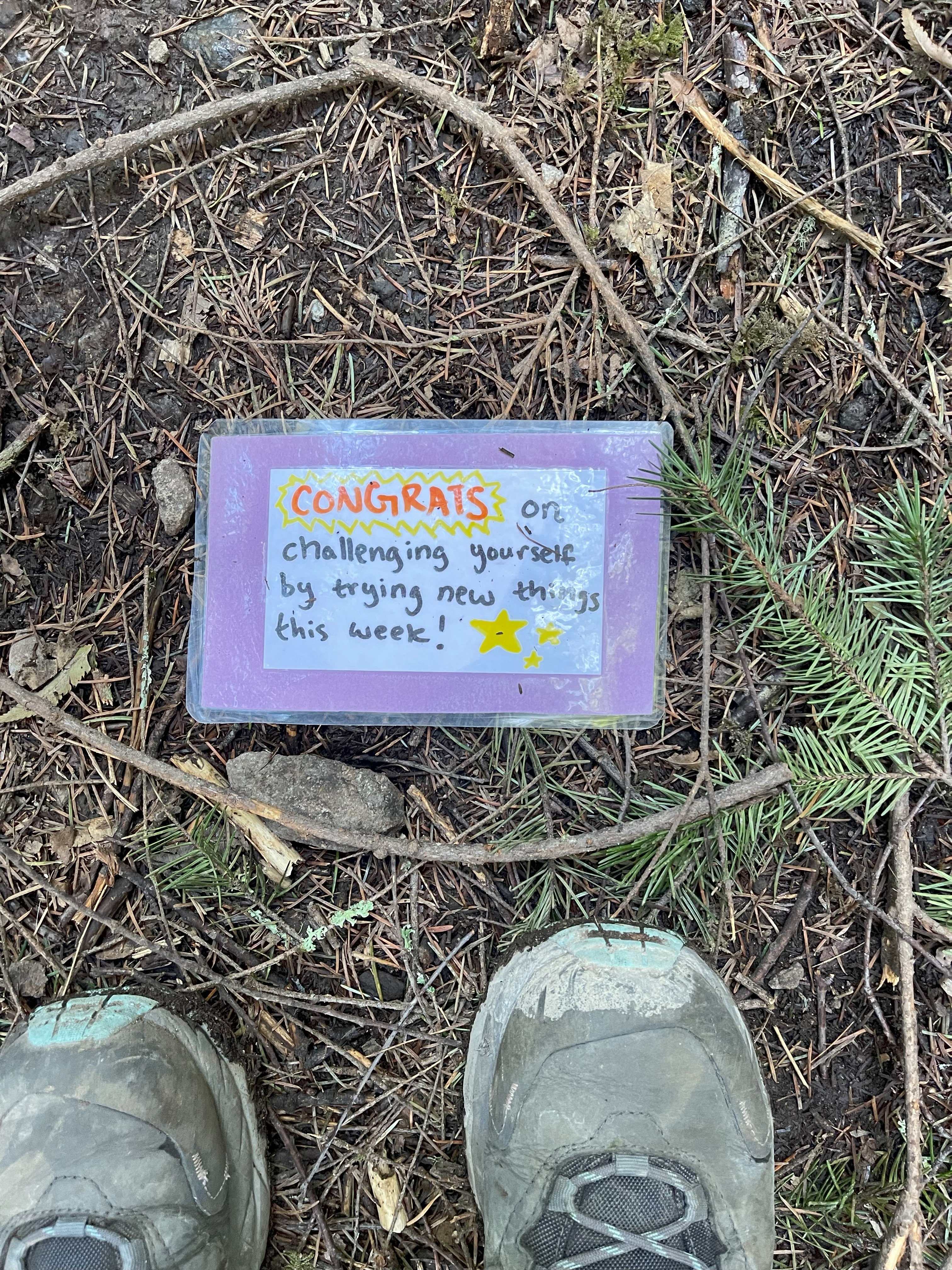 Encouraging sign and boots. Photo by Natalie Reszka