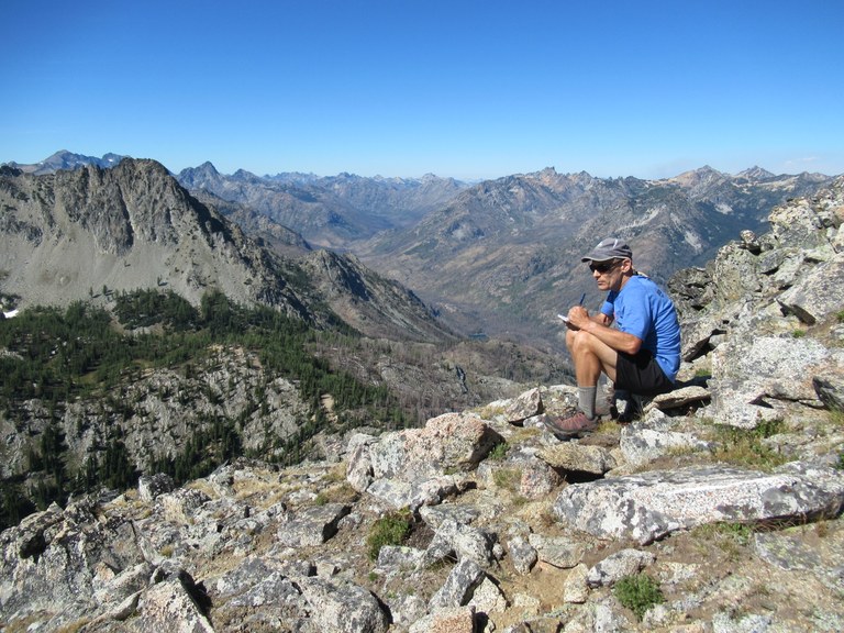 Craig sitting atop Garland Peak in the Entiat Mountains.