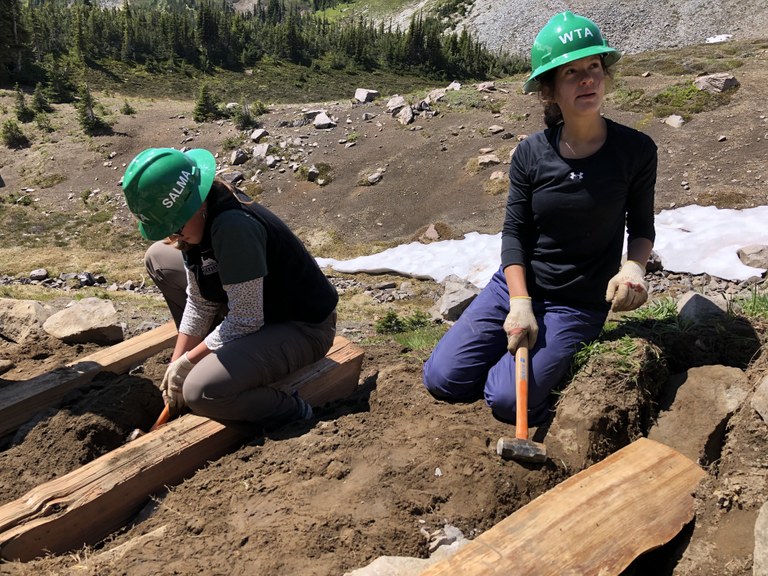Latina trail crew working on stairs at Mount Rainier National Park. 