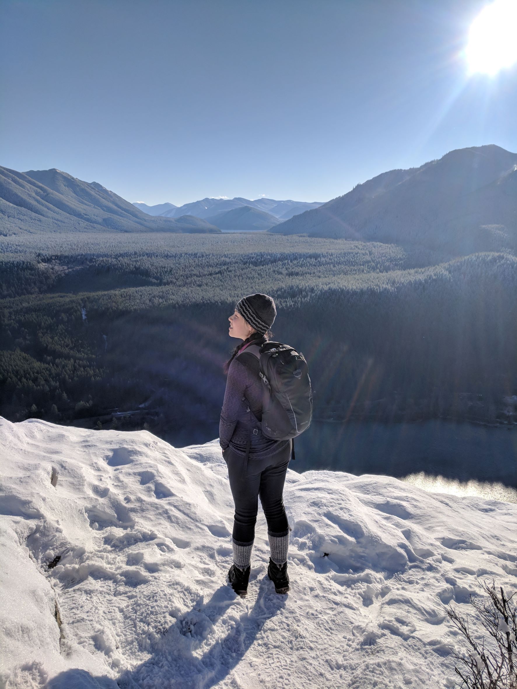 Tiffany standing on Rattlesnake Ledge covered in snow. Photo by Tiffany Chou.