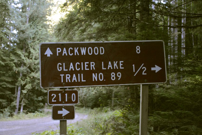 Signs with horizontal road numbers indicate roads with a higher level of maintenance than vertical signs. Photo by A USFS road sign.