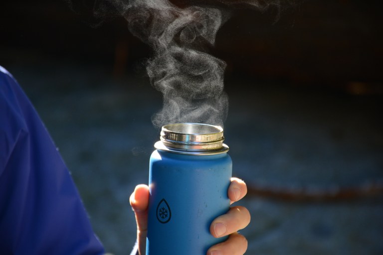 A steaming thermos.