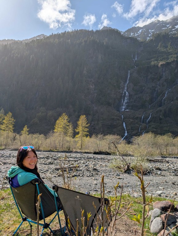 Tiffany Chou in a camping chair at Enchanted Valley. Photo by Vince Rhodes. 