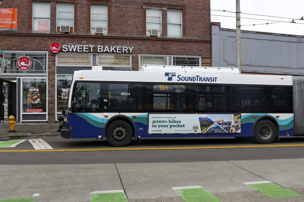 WTA advertisement on a Sound Transit bus. A WTA advertisement on a Sound Transit bus reads "4000+ hikes in your pocket."