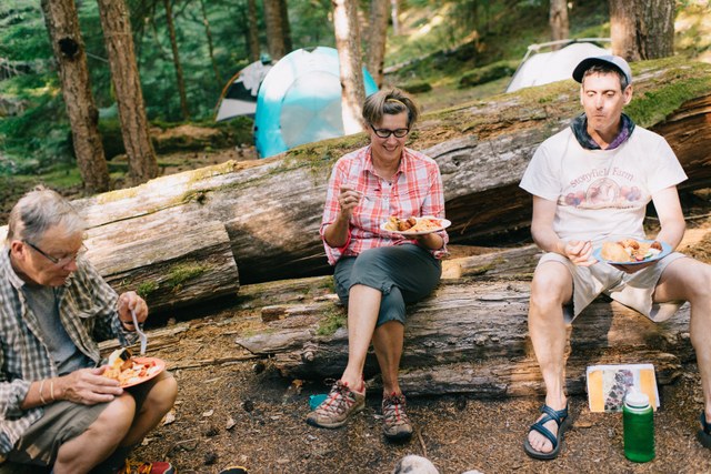Steve, Jennifer and Eric enjoy a relaxing dinner at camp after working. Photo by Karen K. Wang.