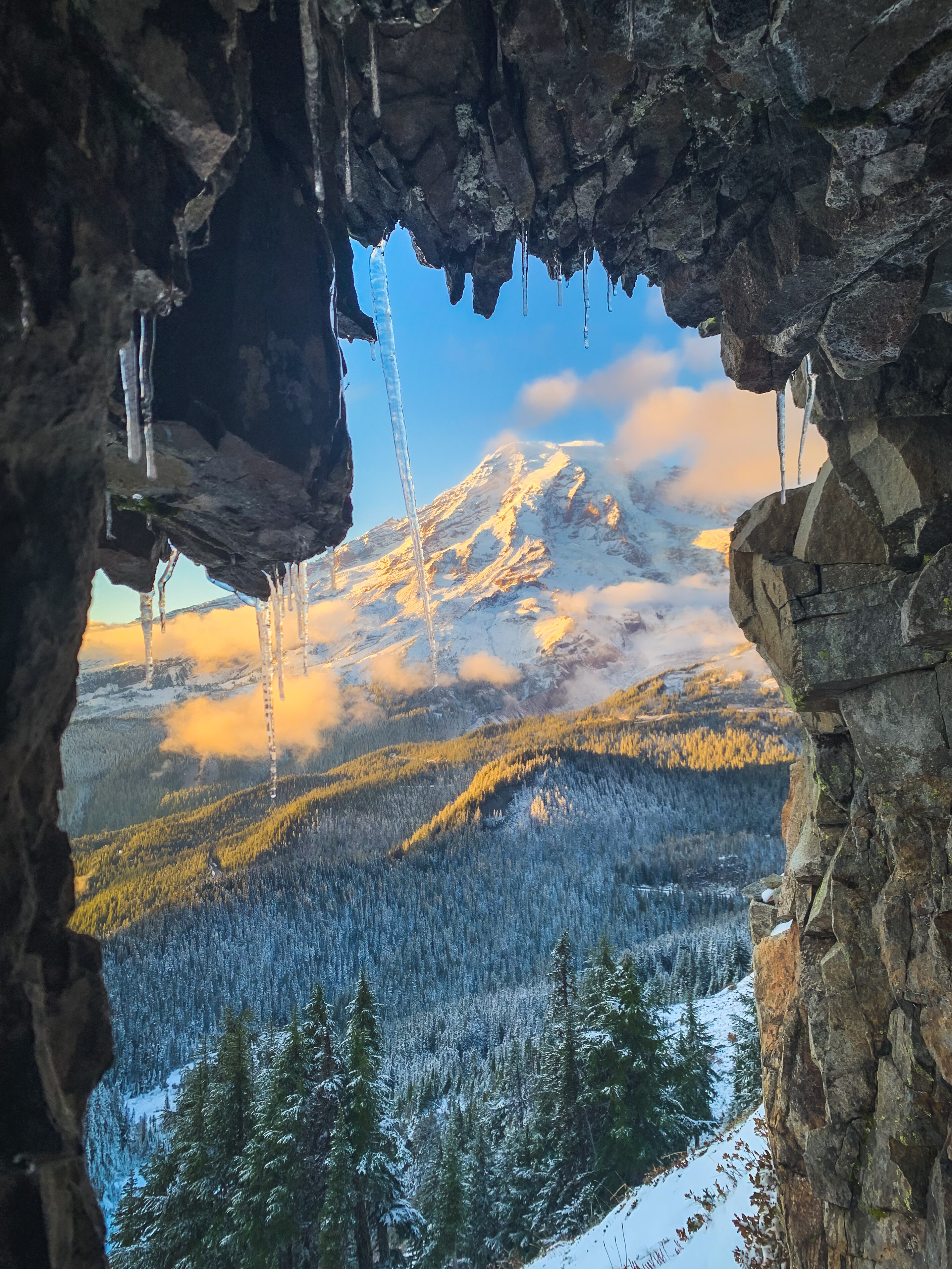 Photo by Rachel Bartle Mountain with snow through stone archway at Mount Rainier