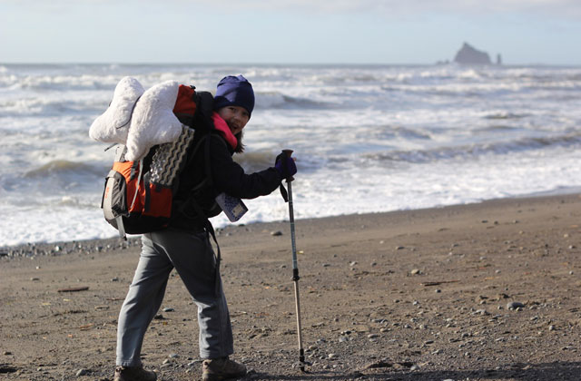 Elissa smiles on a beautiful day backpacking the Olympic coast. Photo courtesy Lorelei Felchlin. 
