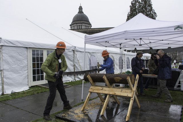 WTA sawyers demonstrated their crosscut skills at Big Tent Rally Day, which also took place Feb. 15. Photo by Erik Haugen-Goodman.