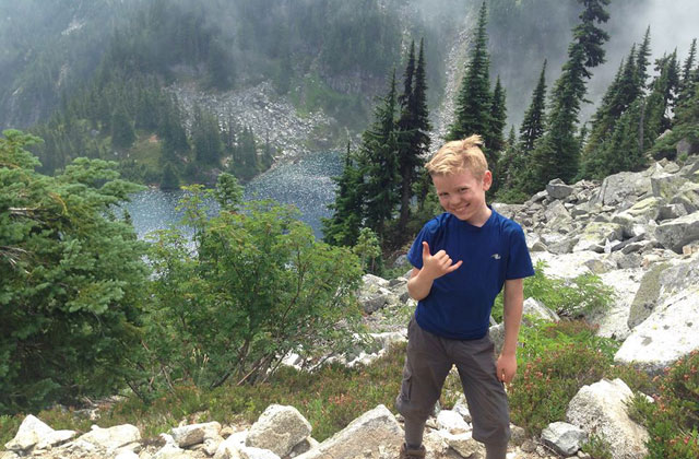 Joey rockin' out above Trap Lake. Photo by Briana Alexander.