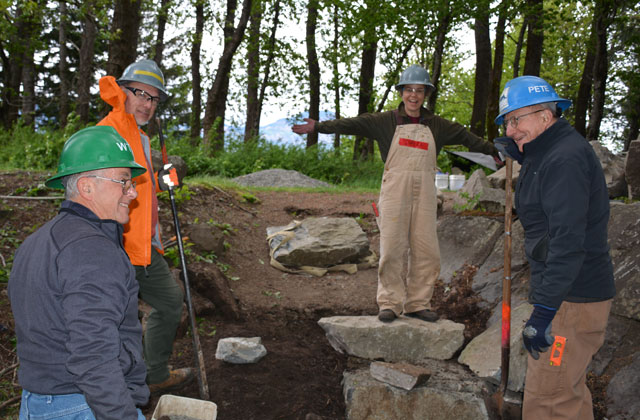 The rock crew grins after a successful rock placement with the help of some rigging. Photo by Anna Roth. 