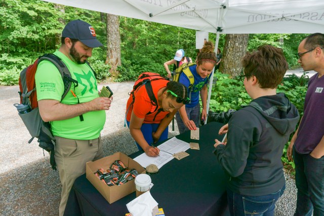 More hikers sign the petition to fund trails. Photo by Erik Haugen-Goodman.