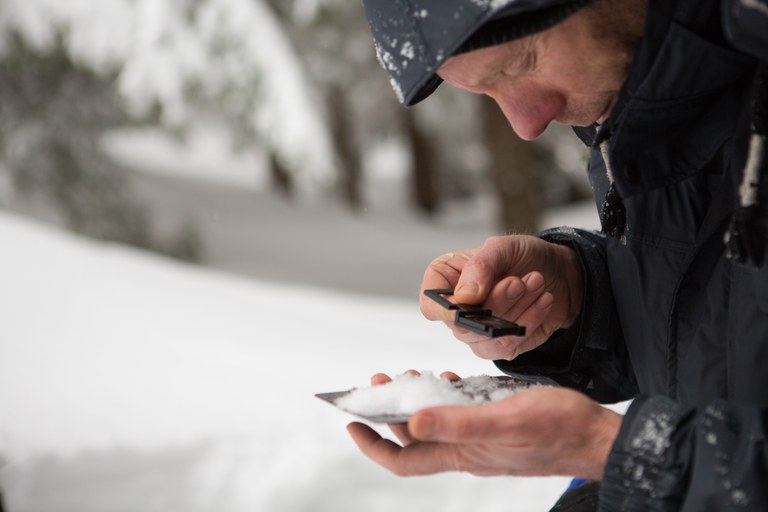 Analyzing snow. Photo by Emma Cassidy. Analyzing snow. Photo by Emma Cassidy..jpg