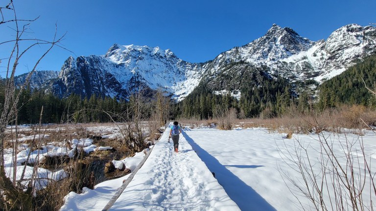 The Big Four Ice Caves trail covered in snow on a sunny day. Photo by Joseph Gonzalez.