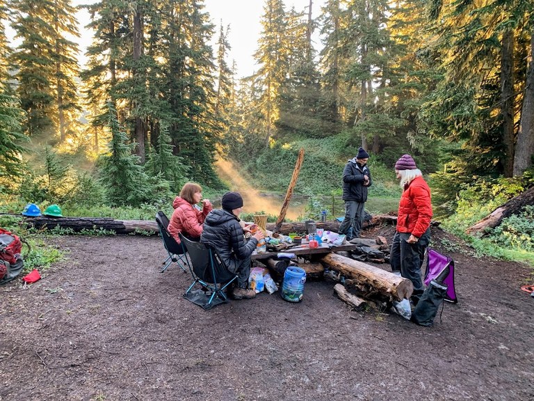 A Green Mountain BCRT crew enjoys a quiet morning breakfast before starting work in 2021. 