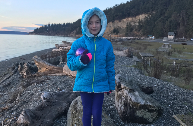 kid at campground in coat in winter