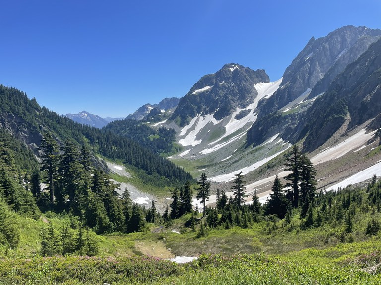 Cascade Pass. Photo by rain-or-shine-hike-hunter. View of Stehekin Valley on a sunny day from Cascade Pass. Photo by rain-or-shine-hike-hunter.