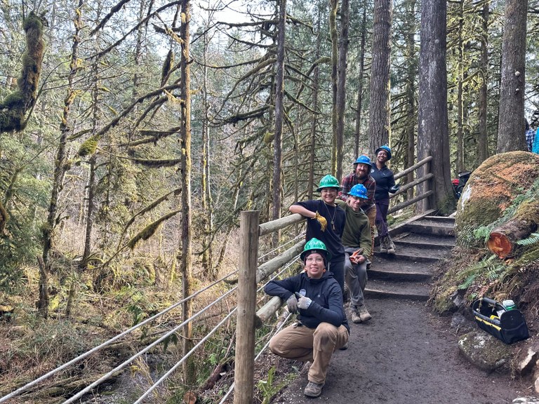 ELP at Wallace Falls. Photo by Angelic Friday. ELP crew taking a group photo along the railing in Wallace Falls State Park. Photo by Angelic Friday.