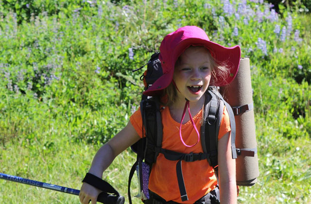 Elissa beams on one of her summer hikes. Photo courtesy Lorelei Felchlin.