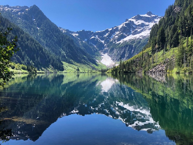 Goat Lake with some snow. Photo by m0therw0lf. Goat Lake reflecting the surrounding hills that are covered in a bit of snow. Photo by m0therw0lf.
