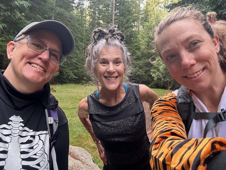 Hikers dressed as a skeleton, spider and tiger on a hike at Heather Park. Photo by Julie Metzger.