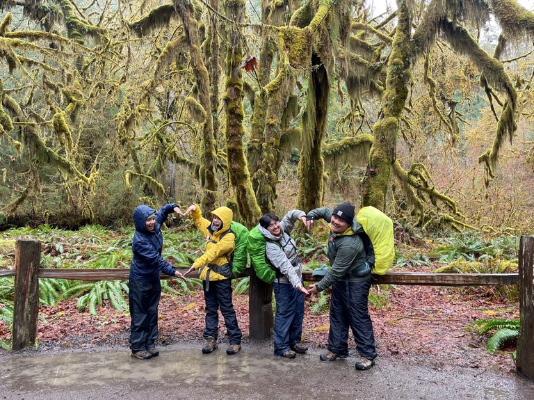 The ELP cohort making hearts with their arms in the Hoh Rainforest. Photo by Michelle Mouw.