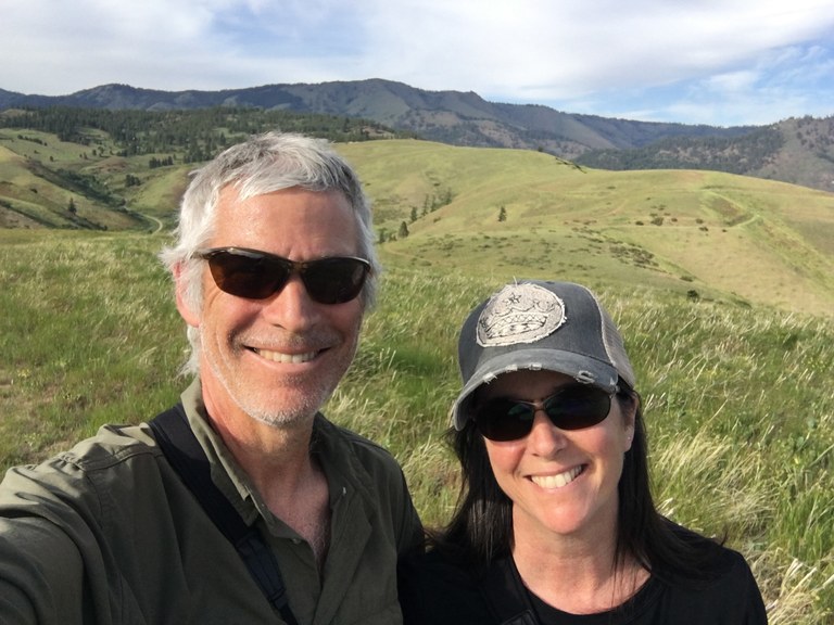 J & J on the trail, smiling at the camera