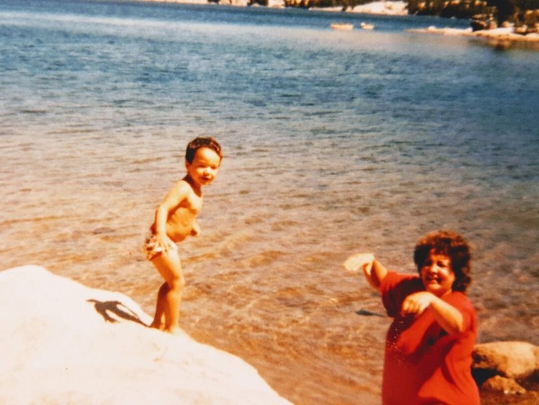 Joe with his mother on the beach. Photo by Joe Gonzalez.