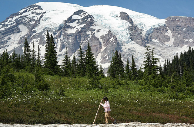 Young girl hiking on snow at Mount Rainier National Park. Photo by Kevin Bacher.