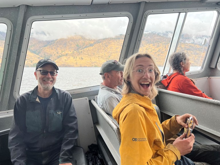 Lake Chelan BCRT. Photo by Sara Lorimer. Crew members on a boat from the worksite on a backcountry response team work party. Photo by Sara Lorimer.