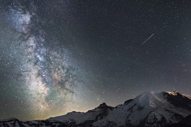 Night sky at Mount Rainier with a shooting star.