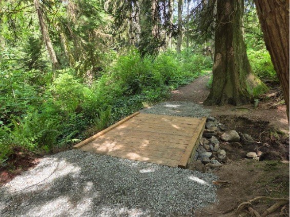 A new bridge on a trail. 