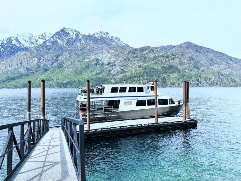 Lady of Lake ferry pulls away from the dock. 