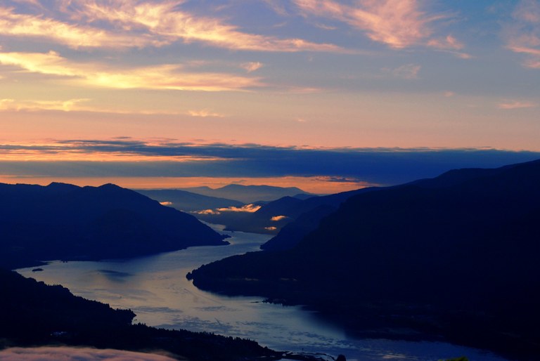 A view of the sunrise over the Columbia River from a high vantage point.