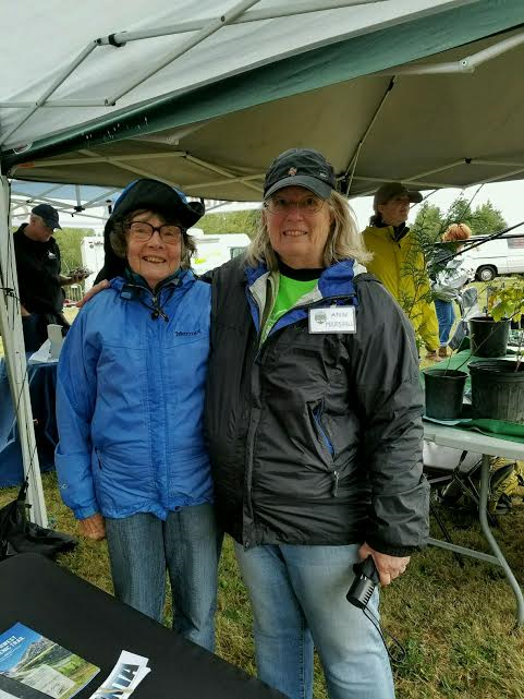 Ann Marshall (right), former editor of Washington Trails Magazine and daughter of WTA founder Louise Marshall, volunteered at the event. Fran Troje (left), former board member, was also in attendance. Photo by Amber Stagg.